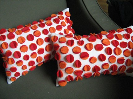 Orange and Red Felt Disc Pillow, $34.