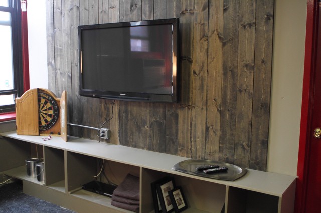 The Red Team's "man cave," featuring Courtland Bascon's entertainment center.