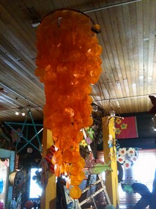 tx_trash_capiz_hanging Capiz shell hanging in vibrant orange! $89 or $99, can't remember. Saw it at Texas Trash & Treasures, in Carmine (see below).