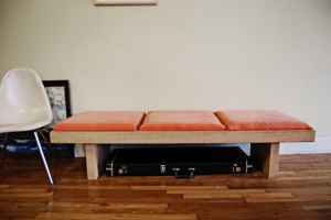 Hardwood bench with orange cushions.  Cute, huh?  No price listed.  They're gonna make you work for it!