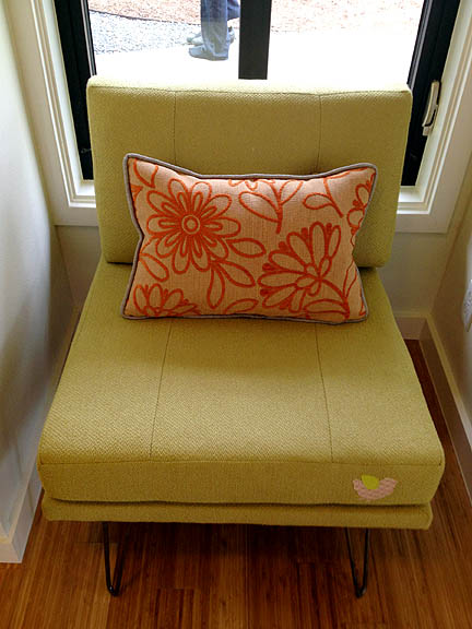 This retro-inspired chair is another of Sheri's designs. She disguised a small tear in the upholstery with a funky little patch.