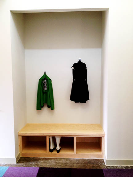 This mudroom-style hall alcove turns outerwear into art.