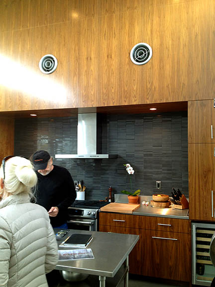Not only is the wood in this kitchen amazing-looking, the backsplash tile is gorgeous and the air vents are supercool.