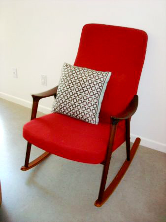 Red mid-century rocker with new upholstery, $450.