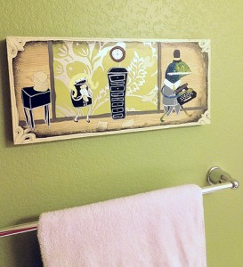 IMG_2156 I purchased this humorous art by Etsy artist Emma Klingbiel for our bathroom. The horizontal piece is perfectly proportioned for hanging over the towel bar.
