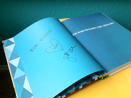 A signed copy of Jonathan Adler's book, "100 Ways to Happy Chic Your Life."