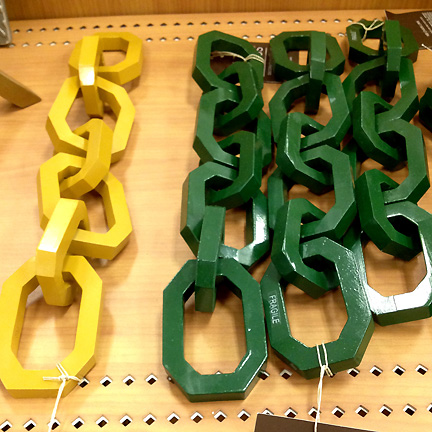 Yellow and emerald green decorative chain objets by Nate Berkus at Target.