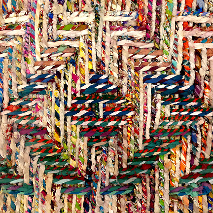 Closeup detail of Threshold's woven multicolored bench at Target