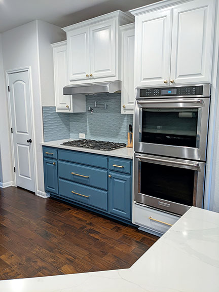 Austin blue and white kitchen remodel with mid-century modern tile backsplash and marble quartz countertops