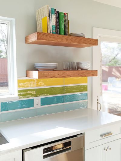 Floating French oak shelves in colorful kitchen remodel in Austin, designed by Room Fu - Knockout Interiors.