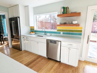 Colorful Austin kitchen remodel, featuring a striped backsplash in aqua, teal, citron, and yellow. Designed by Room Fu.